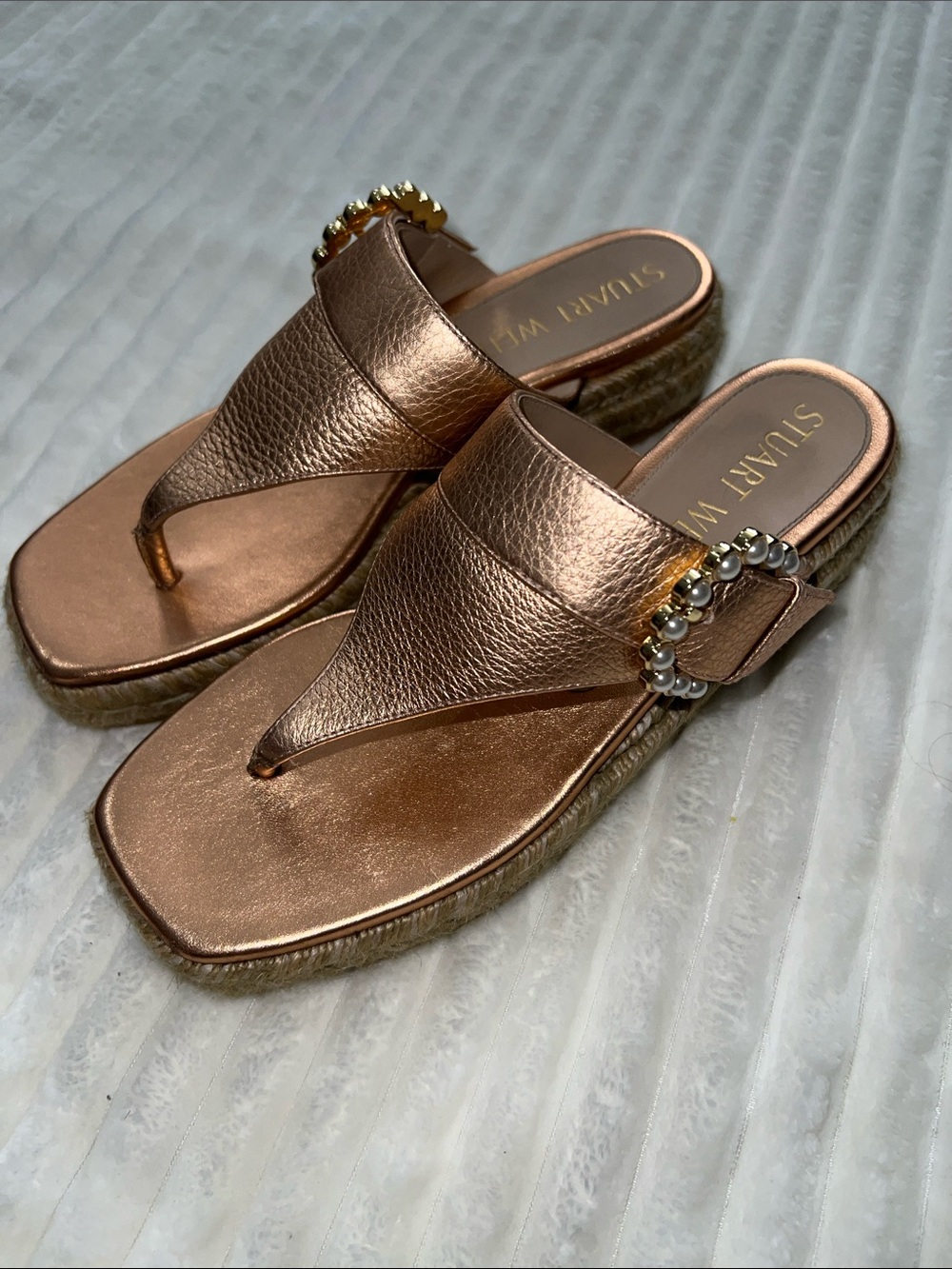 Stuart Weitzman Metallic Rose Gold Leather Thong Sandals with Beaded Buckle